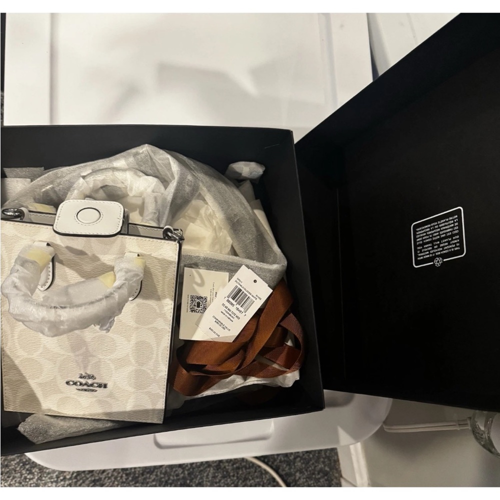 NWT Coach CP011 North South Mini Tote In Signature Canvas
Leather Glacier White